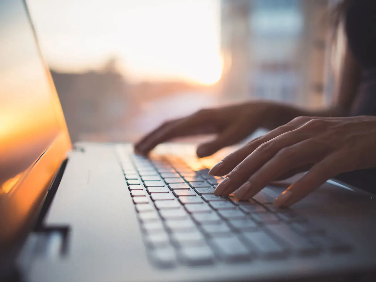 stock-photo-woman-working-at-home-office-hand-on-keyboard-close-up-370595594.jpg