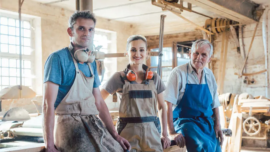 stock-photo-generations-of-carpenters-in-their-family-business-workshop-looking-at-the-camera-1765537133.jpg